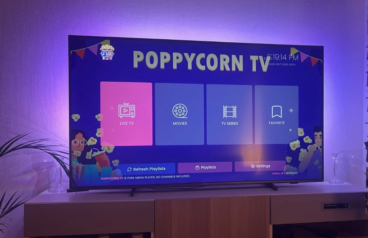 Poppycorn TV IPTV Player on a real Smart TV with purple ambient lighting